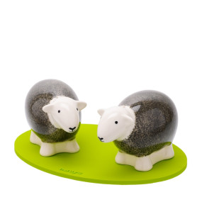 Pair of Grey Herdy Salt and Pepper shakers on a green base